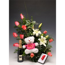 Floral arrangement of roses and lilium